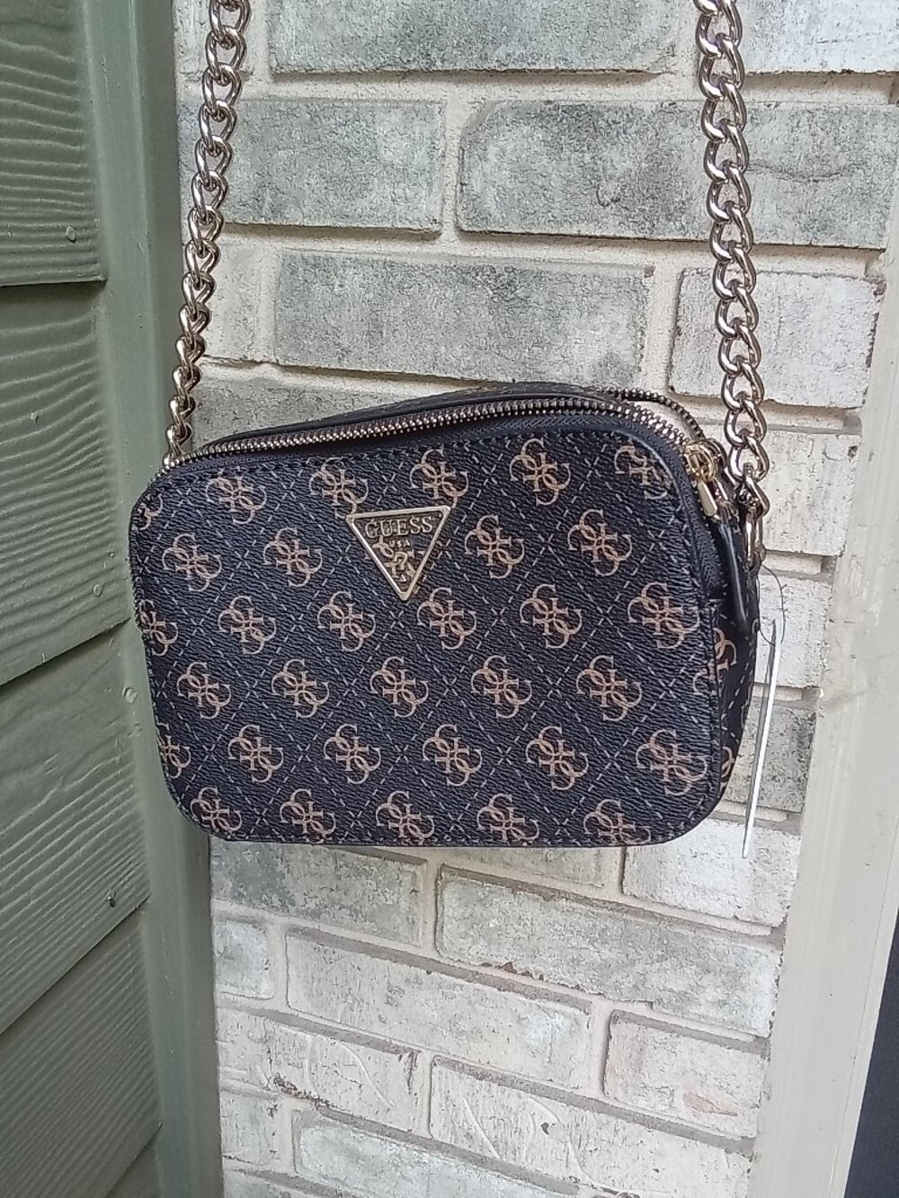 The NEW GUESS Noelle Purse in Brown Logo is a stylish small rectangular shoulder